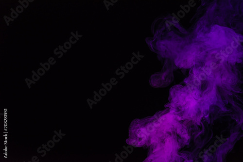 black background with purple smoke with copy space