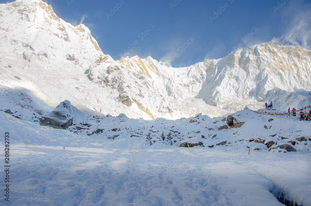 Obraz premium Panorama of snow and mountain Range Landscape with Blue Sky from Annapurna range, Nepal Himalayas.