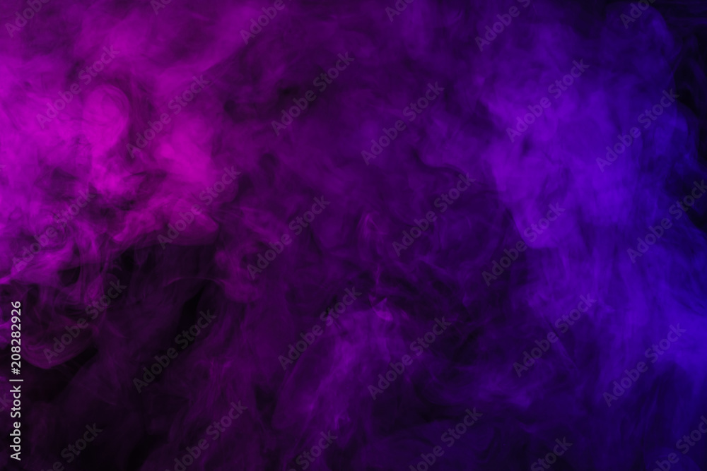violet and pink smoke on abstract black background violet and pink smoke on abstract black background