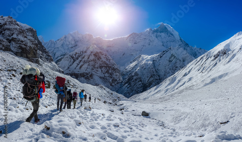 The road in the mountains of Annapurna range with tourist on the way, Nepal Himalayas. travel concept and camping