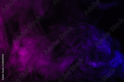 abstract black background with violet and purple smoke