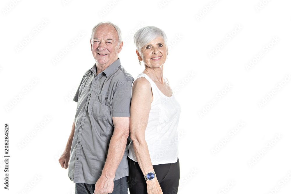 Senior couple posing on studio white background Senior couple posing on studio white background