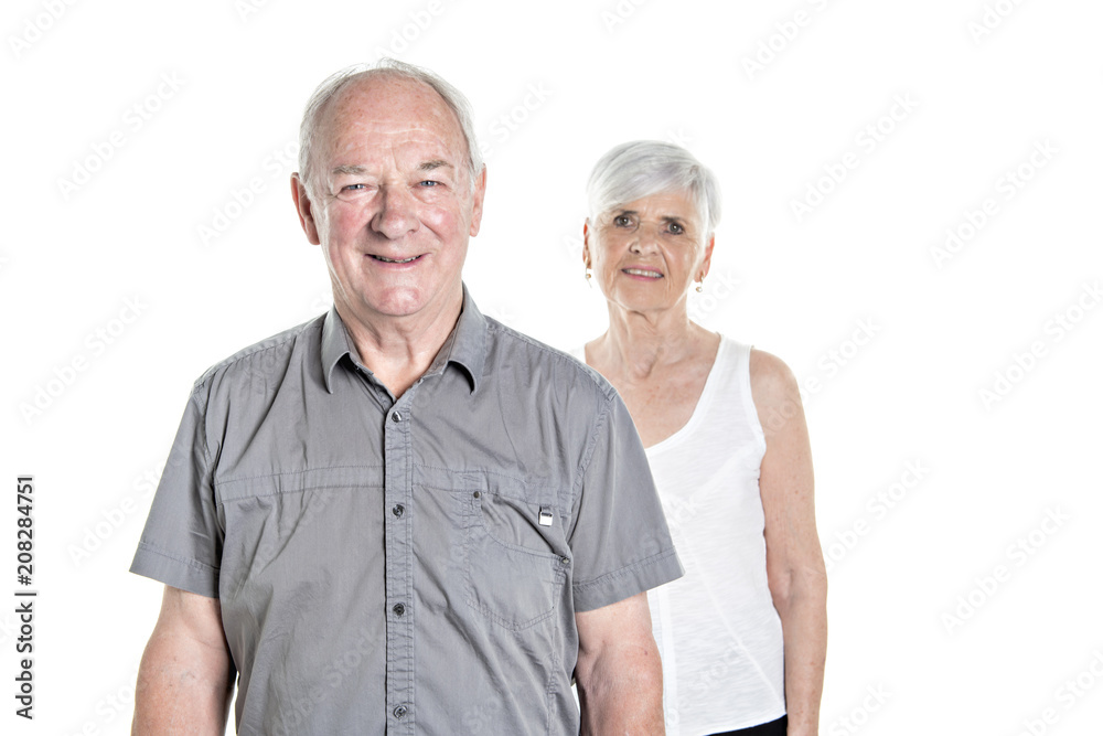 Senior couple posing on studio white background Senior couple posing on studio white background