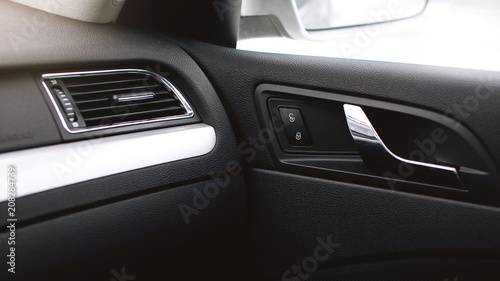 Air condition. Car door handles and electric detail, central locking. © kucheruk