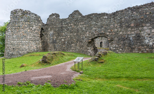 Fotografie Torlundy, Scotland - June 11, 2012: Natural Stone gate to Inverlochy Castle near Fort William