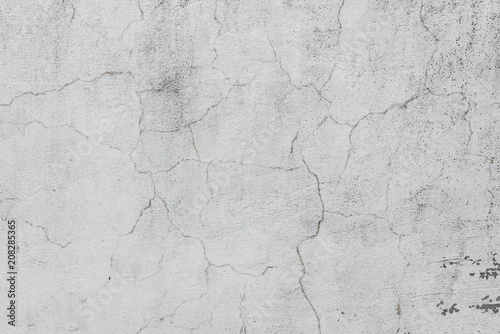 Wall fragment with scratches and cracks