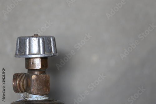 Valve on a large metal gas cylinder photo