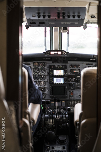 Wallpaper Mural Faceless pilot flying modern aircraft Torontodigital.ca