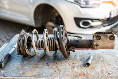 Car suspension repair. Shock absorber.