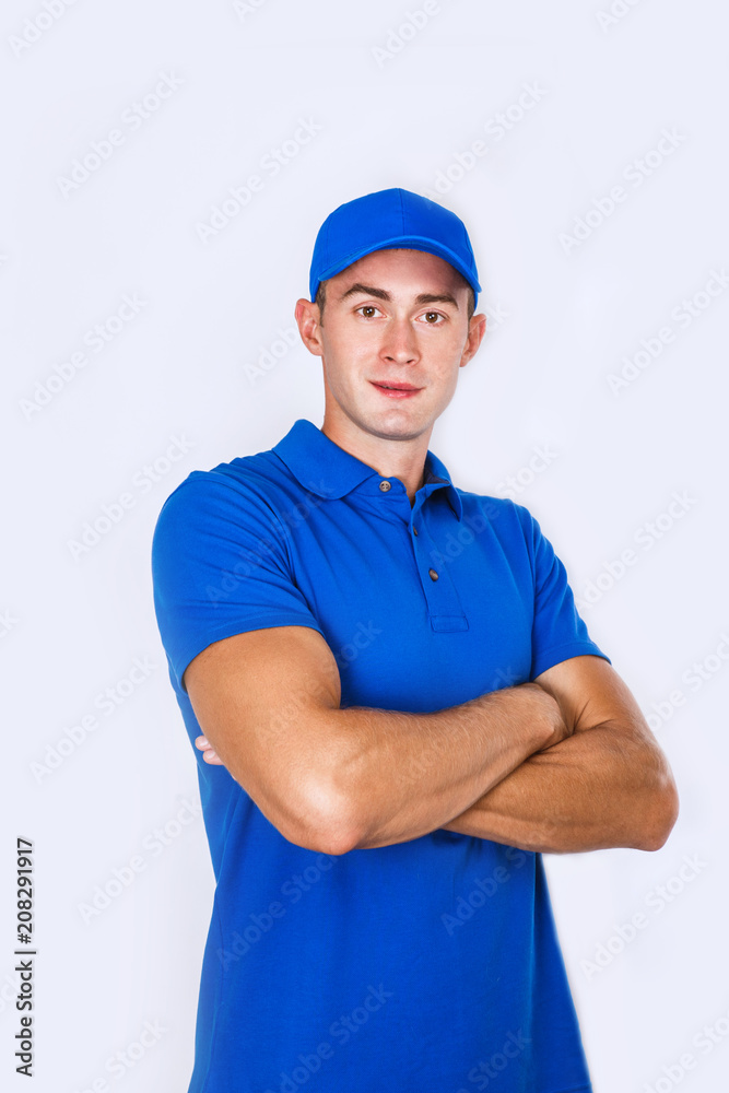 Delivery Concept: Portrait Young caucasian Handsome delivery man or courier