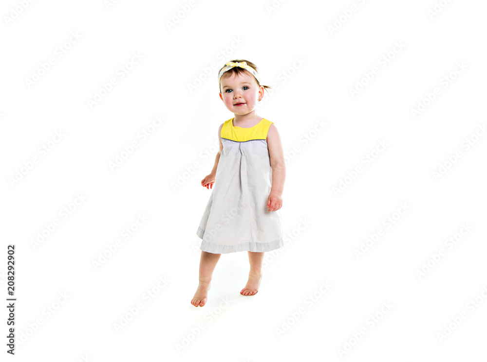 Portrait of a young girl with yellow clothes on photo studio Portrait of a young girl with yellow clothes on photo studio