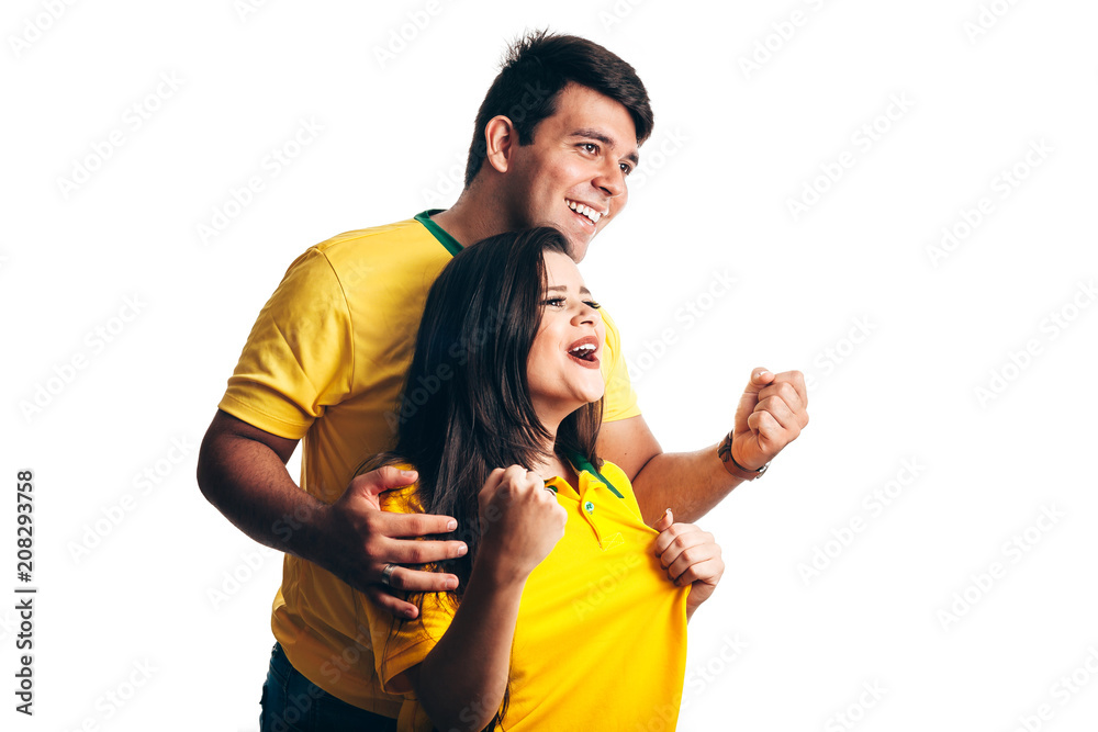 Brazilian couple fan celebrate on white background Brazilian couple fan celebrate on white background