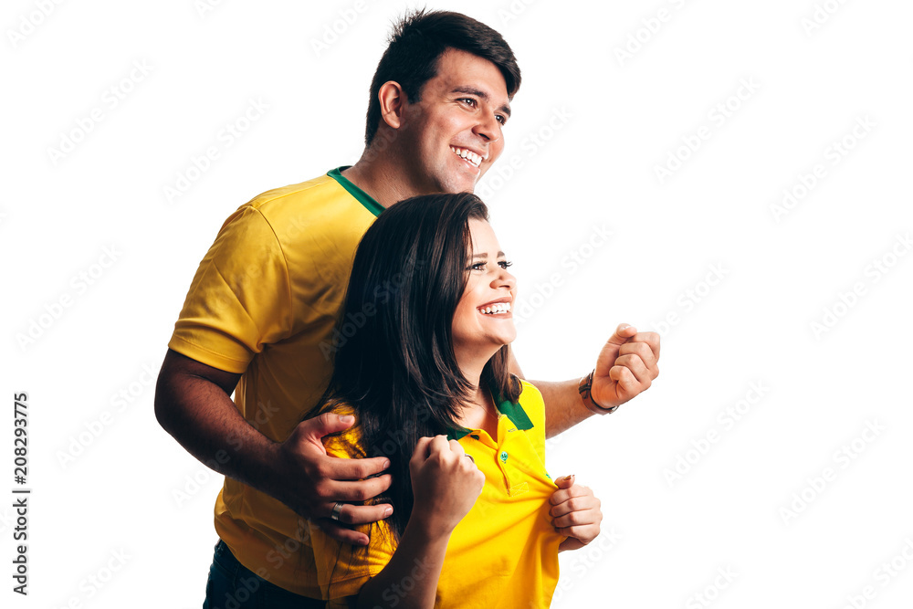 Brazilian couple fan celebrate on white background Brazilian couple fan celebrate on white background