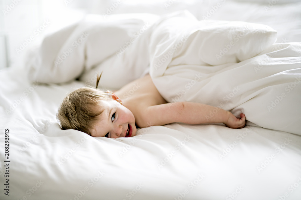 one years girl baby on the bed one years girl baby on the bed