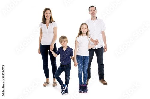 Happy family with two kids on studio white background