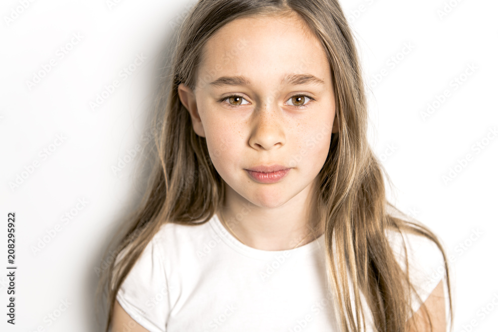 Portrait of cute, confident 9 years old girl, isolated on white Portrait of cute, confident 9 years old girl, isolated on white