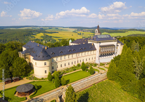 Aerial view of chateau Zbiroh. Romanesque-Gothic castle was founded at the end of the 12th century. Famous tourist attraction in Czech republic, European union.