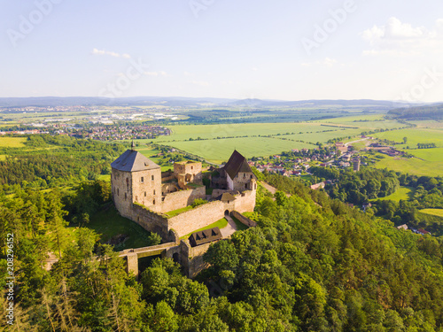 Aerial view of castle Tocnik. Gothic fortress from 14th century. Famous tourist attractions in Czech republic, European union.