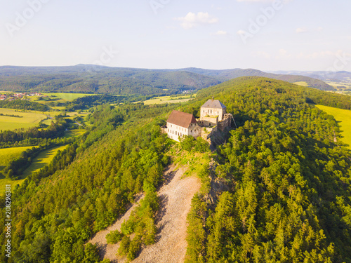 Aerial view of castle Tocnik. Gothic fortress from 14th century. Famous tourist attractions in Czech republic, European union. photo