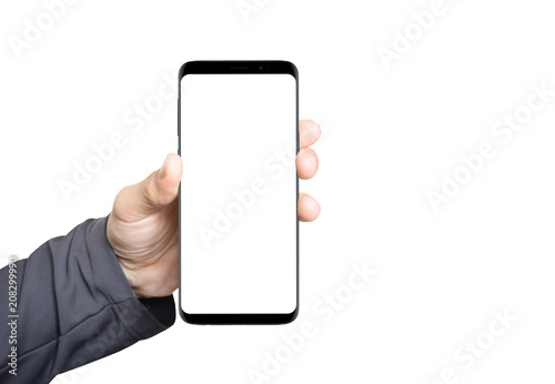 Black smartphone with an isolated white screen for mockup or app presentation in man hand. White background