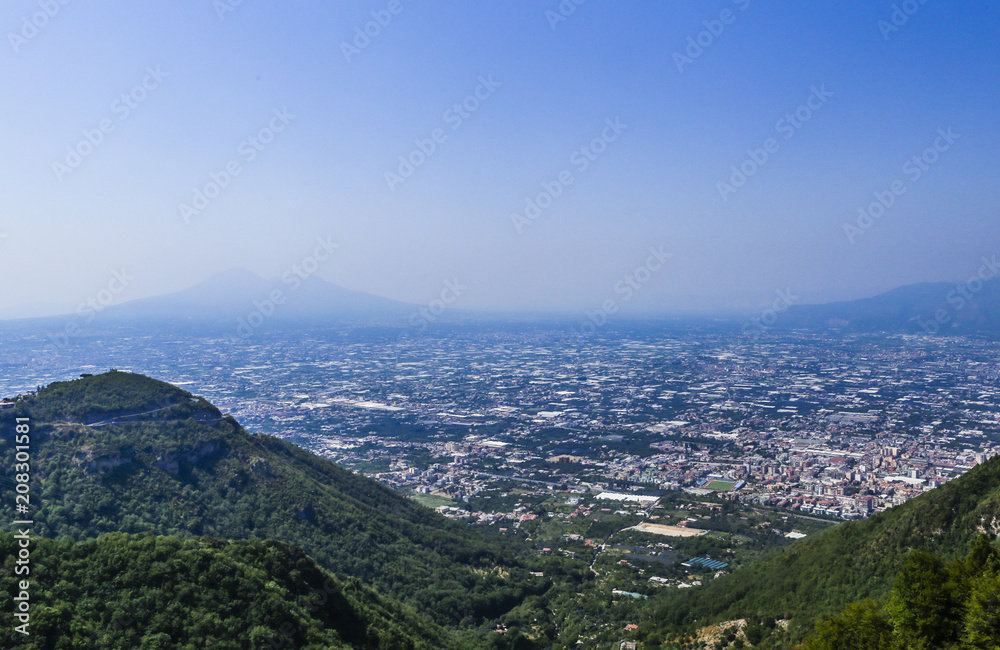 Foggy view of towns south of Mount Vesuvius, Italy