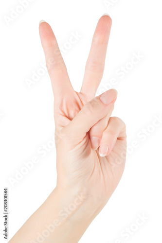 Woman hand showing victory gesture isolated with clipping path