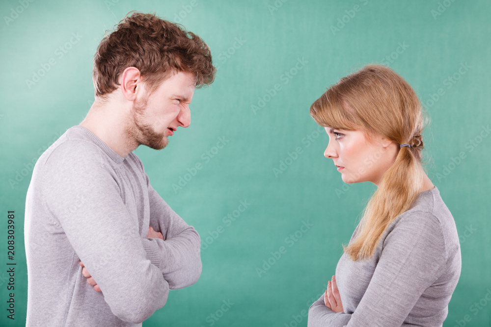 Husband and wife yelling and arguing. Husband and wife yelling and arguing.