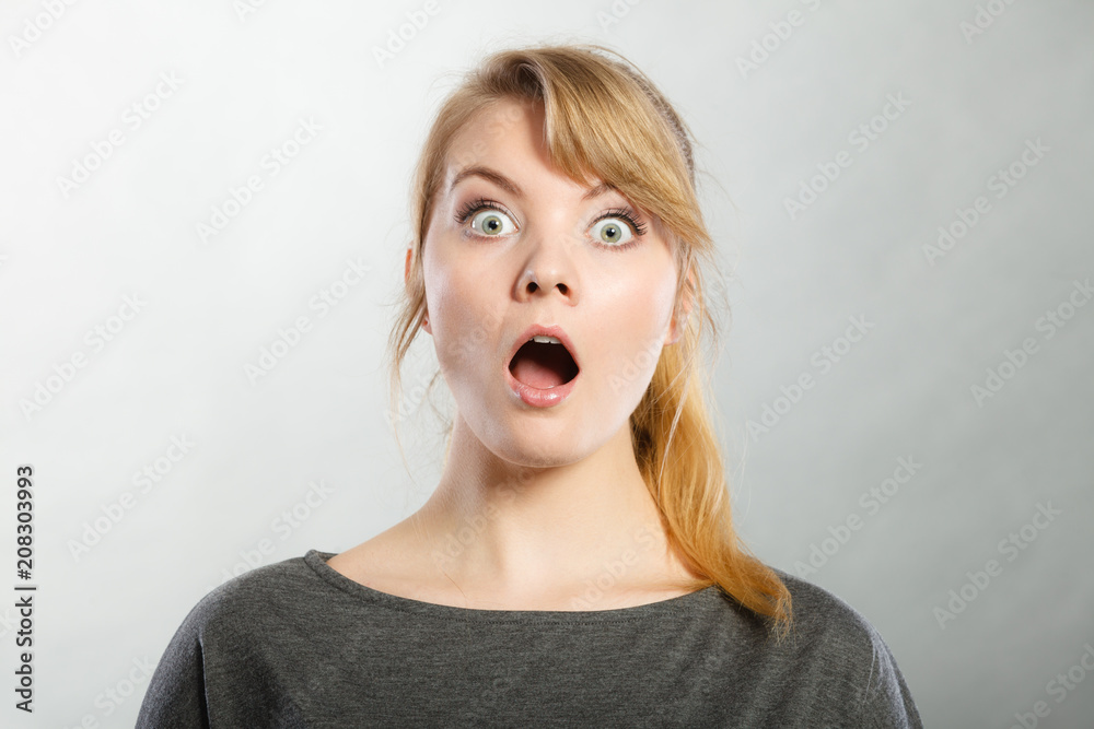 Surprised astonished girl with open mouth. Surprised astonished girl with open mouth.