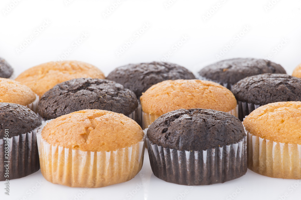 homemade cupcakes isolated on white background, close up