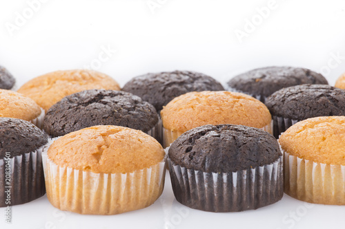 homemade cupcakes isolated on white background, close up