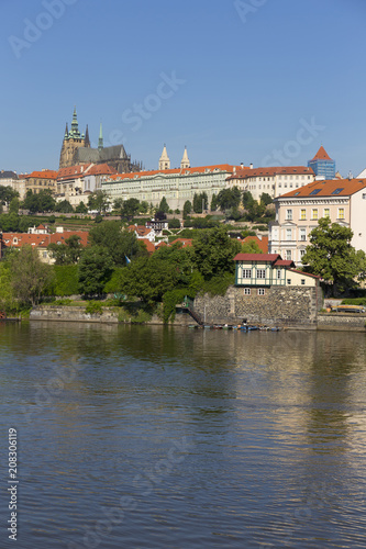 Spring Prague gothic Castle with the Lesser Town above River Vltava in the sunny Day, Czech Republic © Kajano