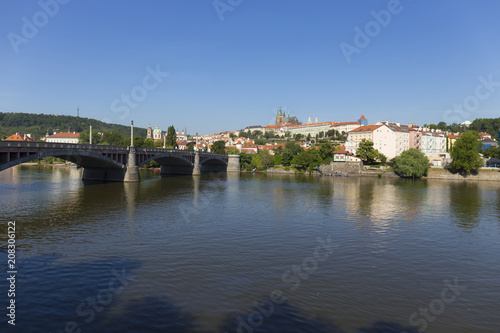 Spring Prague gothic Castle with the Lesser Town above River Vltava in the sunny Day  Czech Republic