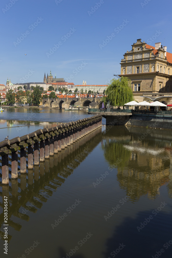 Fototapeta premium Spring Prague gothic Castle with the Lesser Town above River Vltava in the sunny Day, Czech Republic