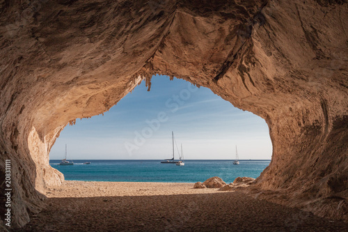 Inside a cave at Cala Luna beach photo