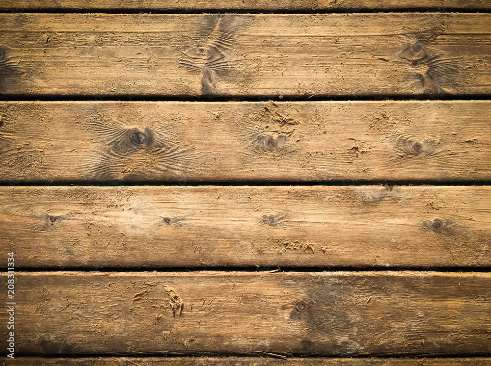 Obraz premium Wooden background with brown horizontal planks. Old and rough wood texture