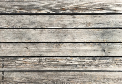 Wooden background with grey horizontal planks. Old and rough wood texture