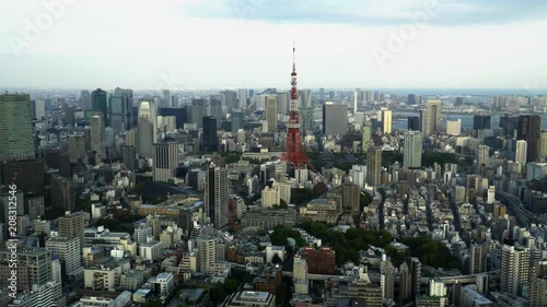 tokyo tower as seen from the observation deck of the roppongi hills mori tower in tokyo, japan photo