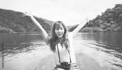 Asian woman enjoying an outdoor trip © Rawpixel.com