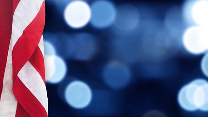 American Flag With Blue Bokeh Lights Background for United States Holidays
