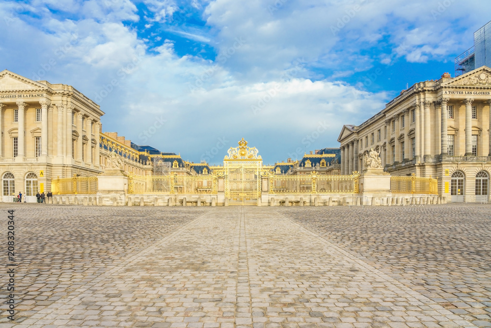 Main entrance of Versailles Palace, Versailles, France. Palace Versailles was a royal chateau. It was added to UNESCO list of World Heritage Sites.