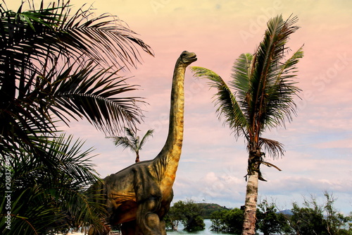 Fototapeta Naklejka Na Ścianę i Meble -  Sauropods Dinosaur  on beautiful landscape background.