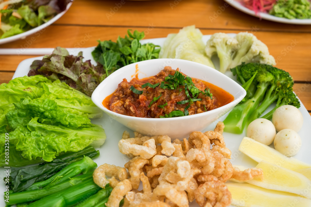 Thai Northern Style, Pork and Tomato eat with fresh vegetables Thai Northern Style, Pork and Tomato eat with fresh vegetables