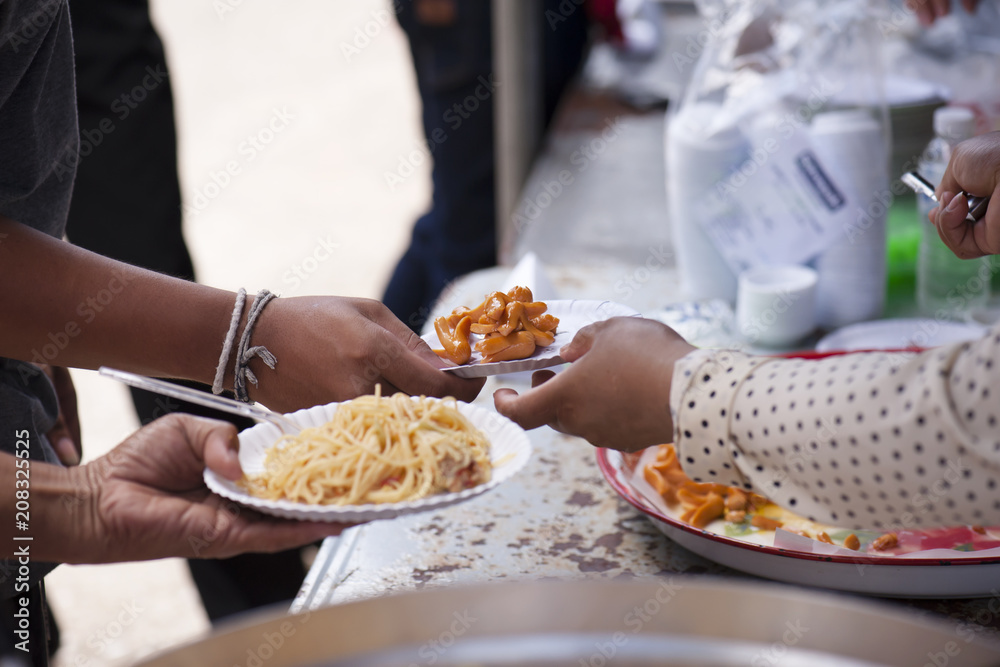 Feeding the poor to help each other in society. Charity concept