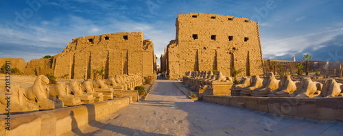 Karnak Temple, The ruins of the temple,  Embossed hieroglyphs on the wall photo