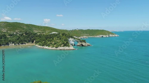 Amazing Blue beach line Drone 4k flight in Italy photo