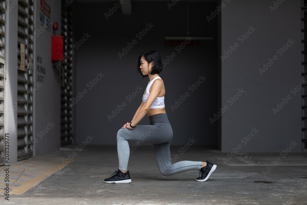 Young woman in a lunge