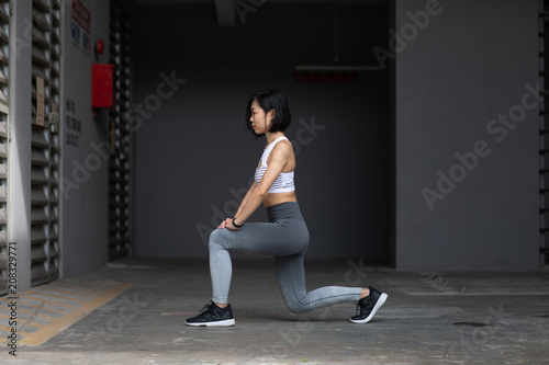 Young woman in a lunge