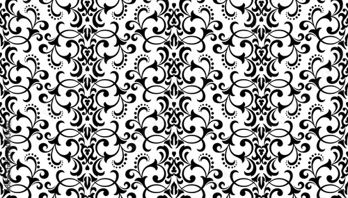 Wallpaper in the style of Baroque. A seamless vector background. White and black floral ornament. Graphic pattern for fabric, wallpaper, packaging. Ornate Damask flower ornament