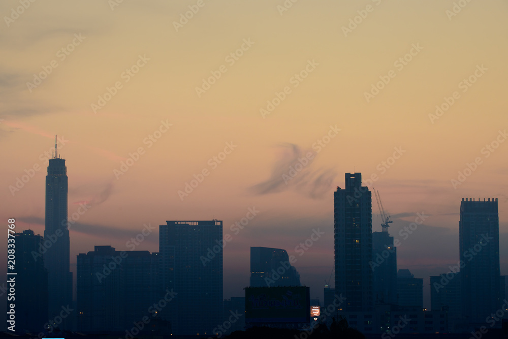 Silhouette of Bangkok city view with beautiful sunrise background