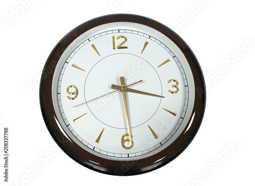 large wall clock isolated on white background. half past four